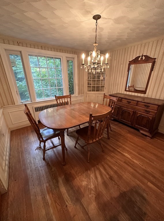 72 Redlands Road Boston, MA 02132 - Photo 3 of 19 a view of a dining room with furniture window and wooden floor