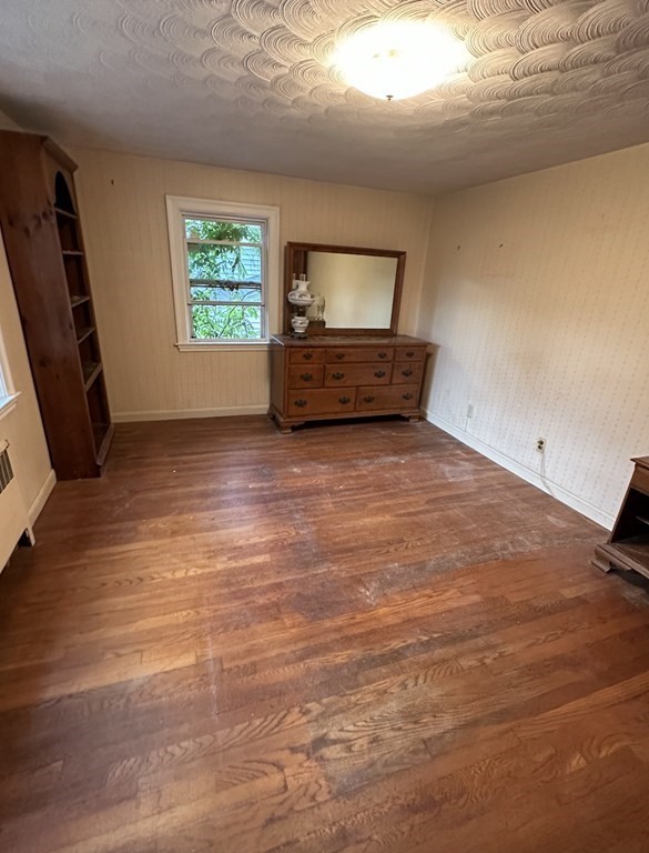 72 Redlands Road Boston, MA 02132 - Photo 10 of 19 a view of room with window and a flat screen tv