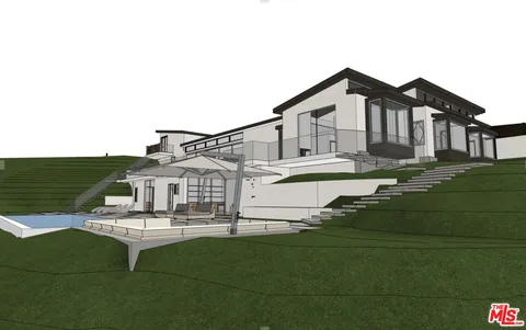 a house with river in front of it