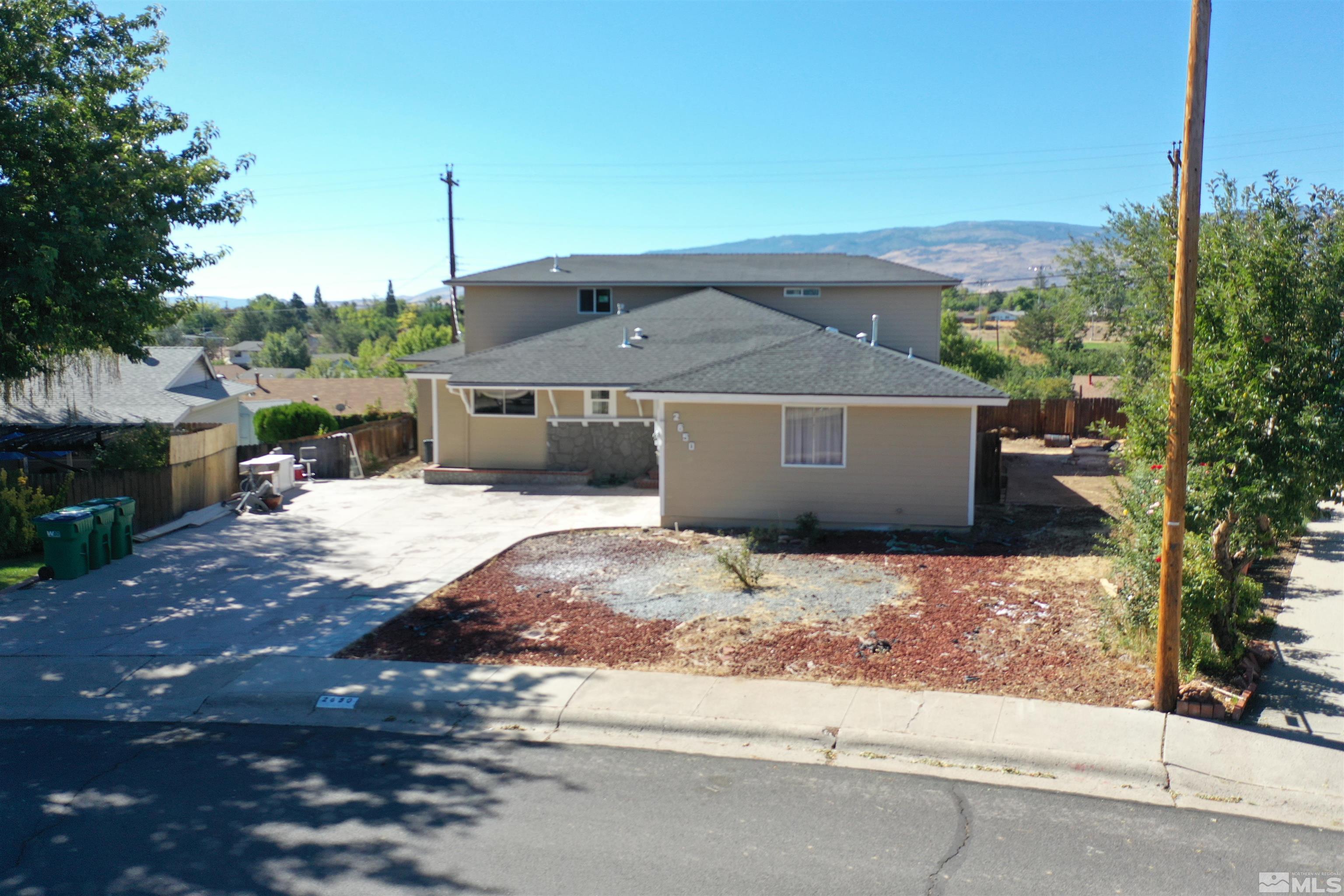 2650 Apollo Way Reno, NV 89503 - Photo 14 of 36 a view of a house with a snow in the background