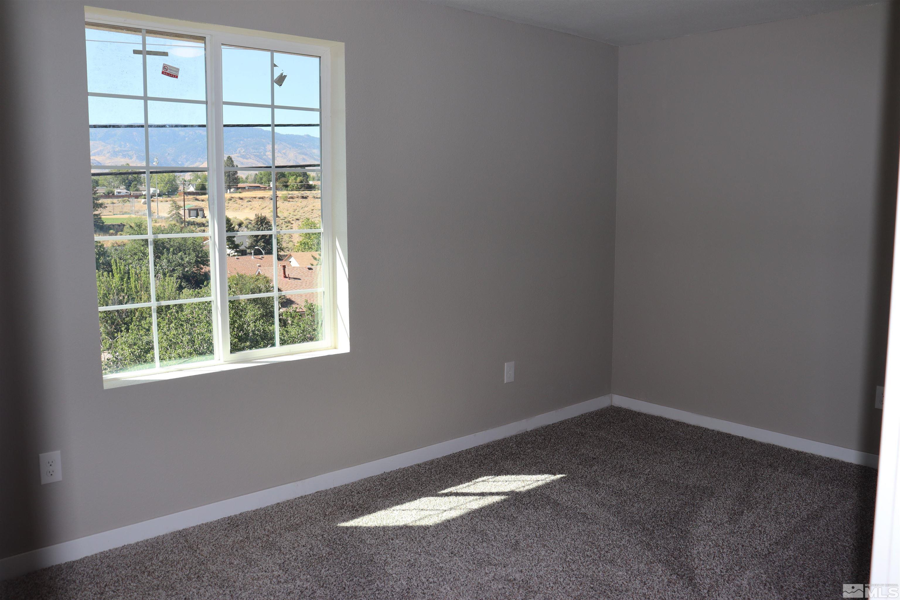 2650 Apollo Way Reno, NV 89503 - Photo 16 of 36 an empty room with a window