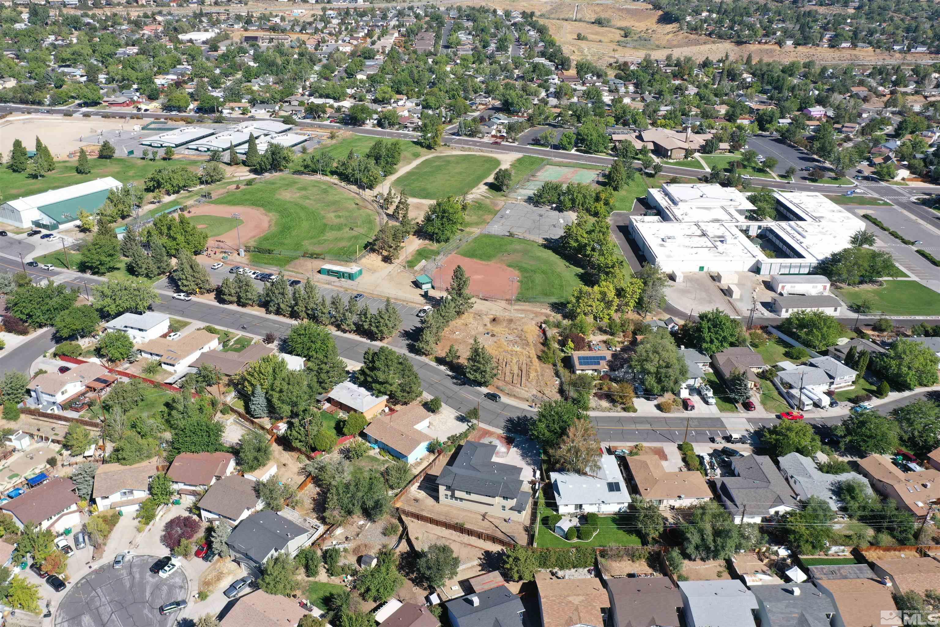 2650 Apollo Way Reno, NV 89503 - Photo 3 of 36 an aerial view of residential houses with outdoor space
