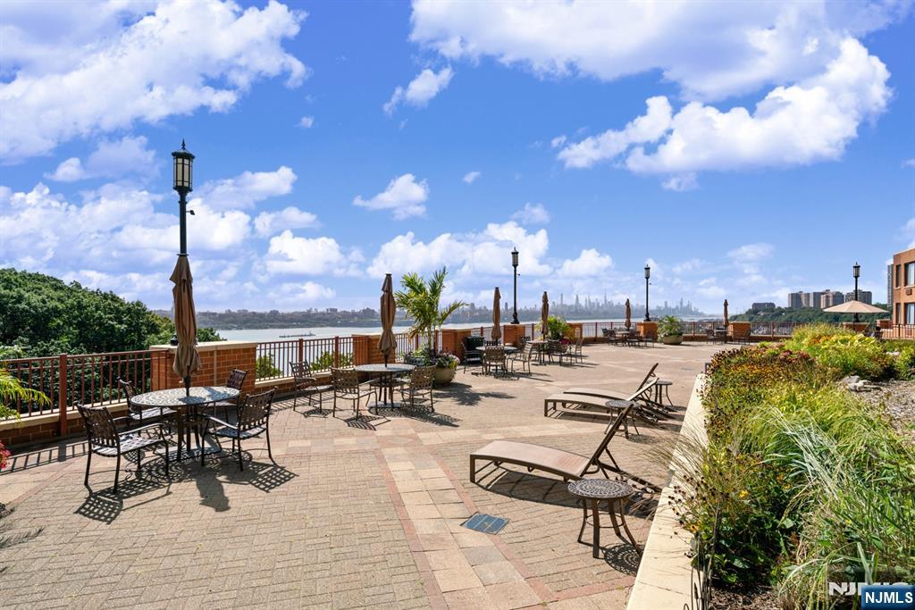 100 Old Palisade Road, Unit 2311 Fort Lee, NJ 07024 - Photo 24 of 25 a view of a terrace with sitting area