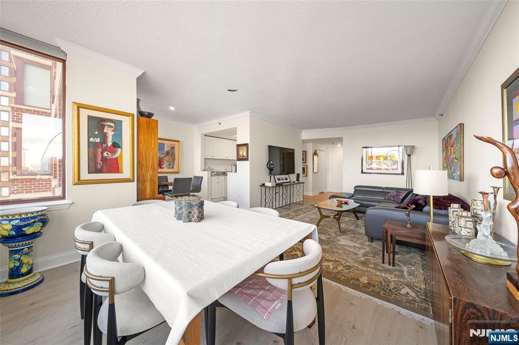 100 Old Palisade Road, Unit 2311 Fort Lee, NJ 07024 - Photo 7 of 25 a view of a dining room with furniture and window