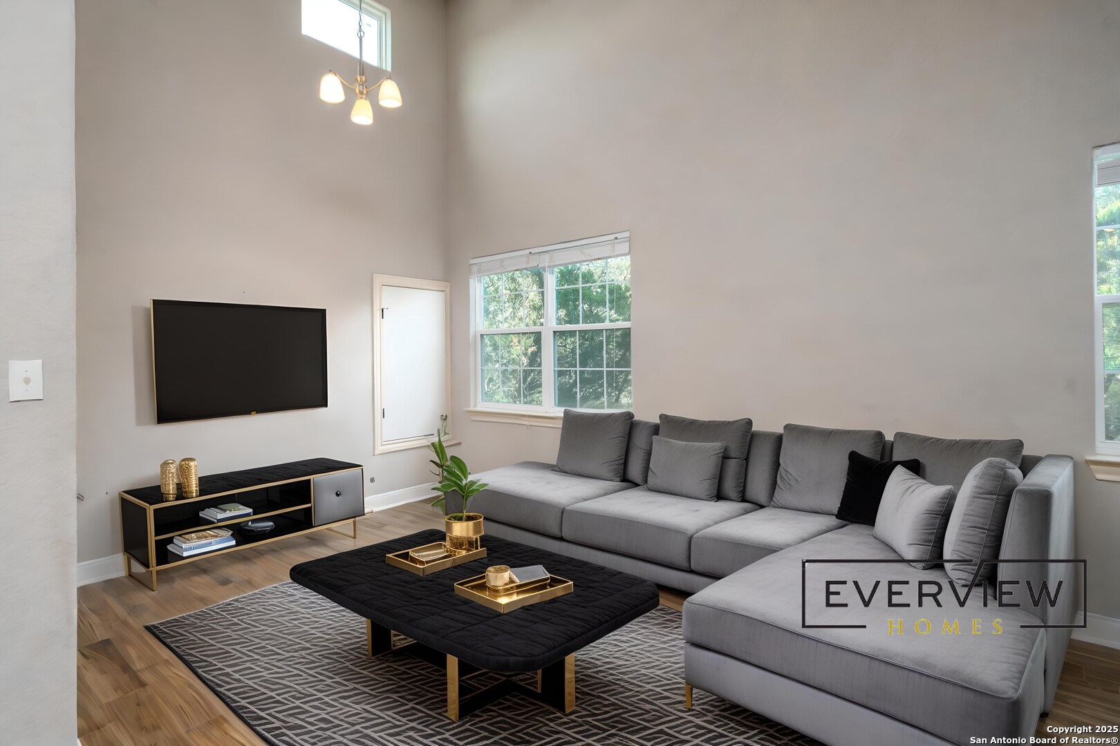 3067 View Ridge Drive, Unit 7 Spring Branch, TX 78070 - Photo 3 of 21 a living room with furniture and a flat screen tv