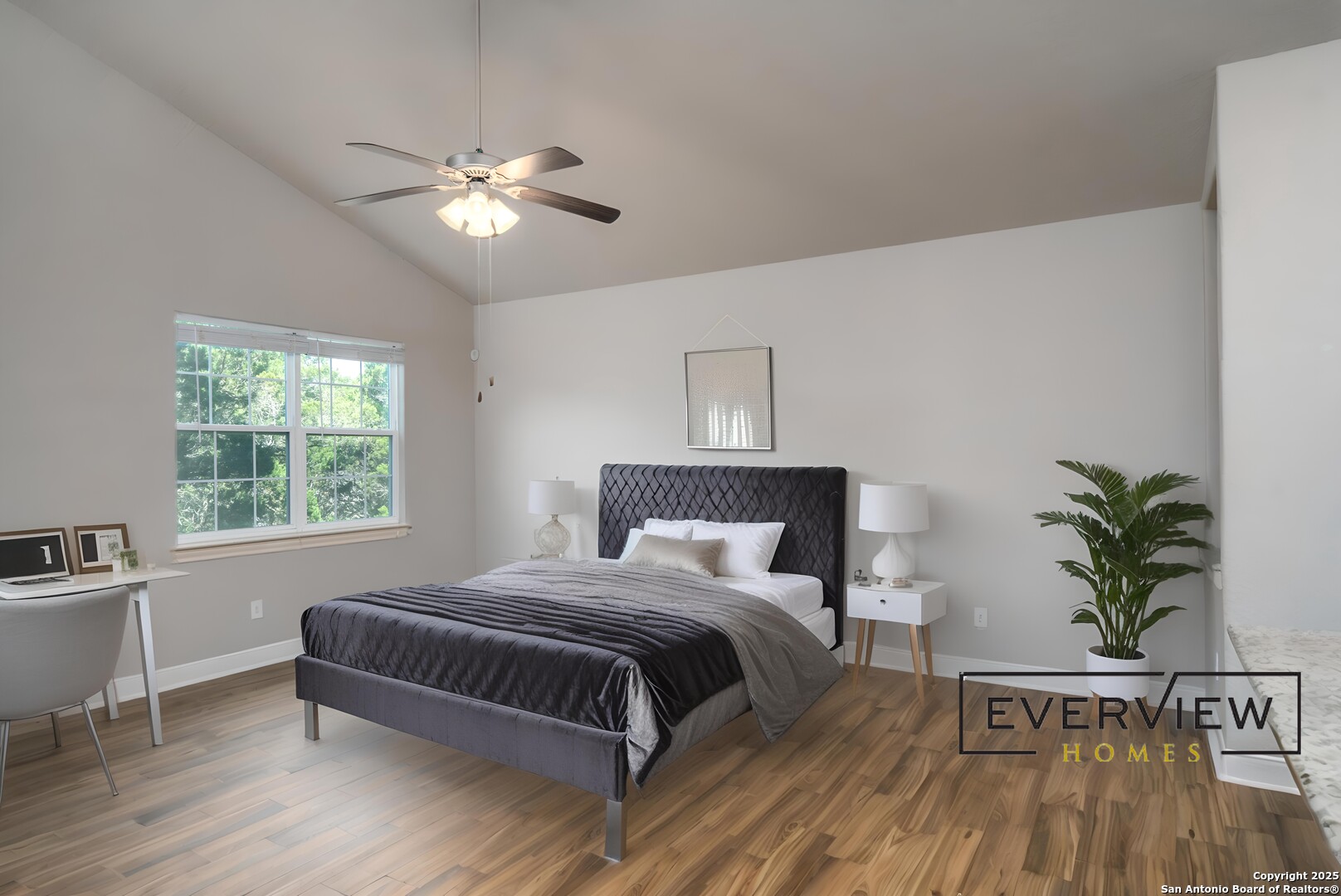 3067 View Ridge Drive, Unit 7 Spring Branch, TX 78070 - Photo 4 of 21 a bedroom with a large bed chandelier and a window