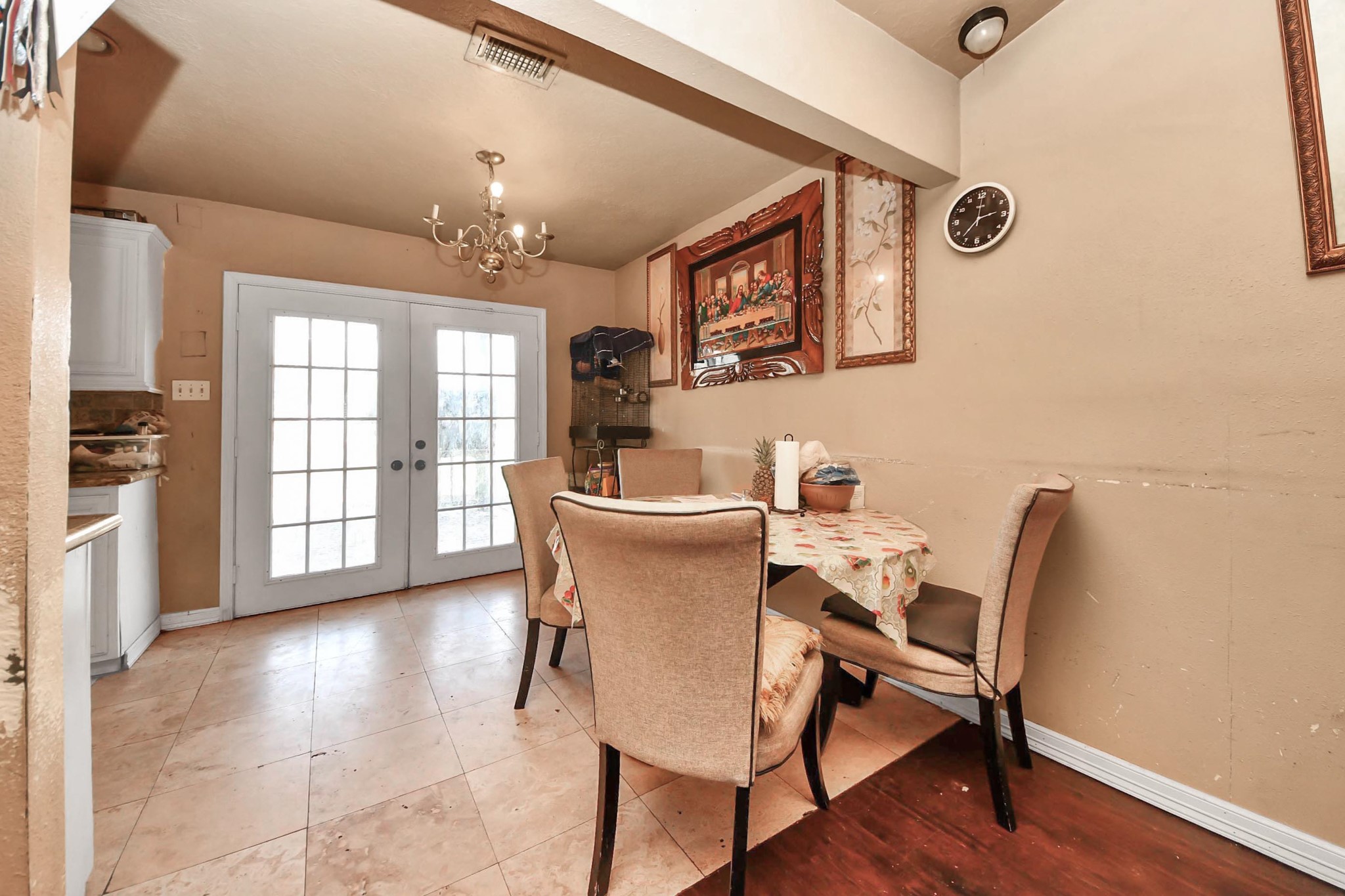 6719 Rubilee Avenue Humble, TX 77396 - Photo 6 of 23 a view of a dining room with furniture and wooden floor