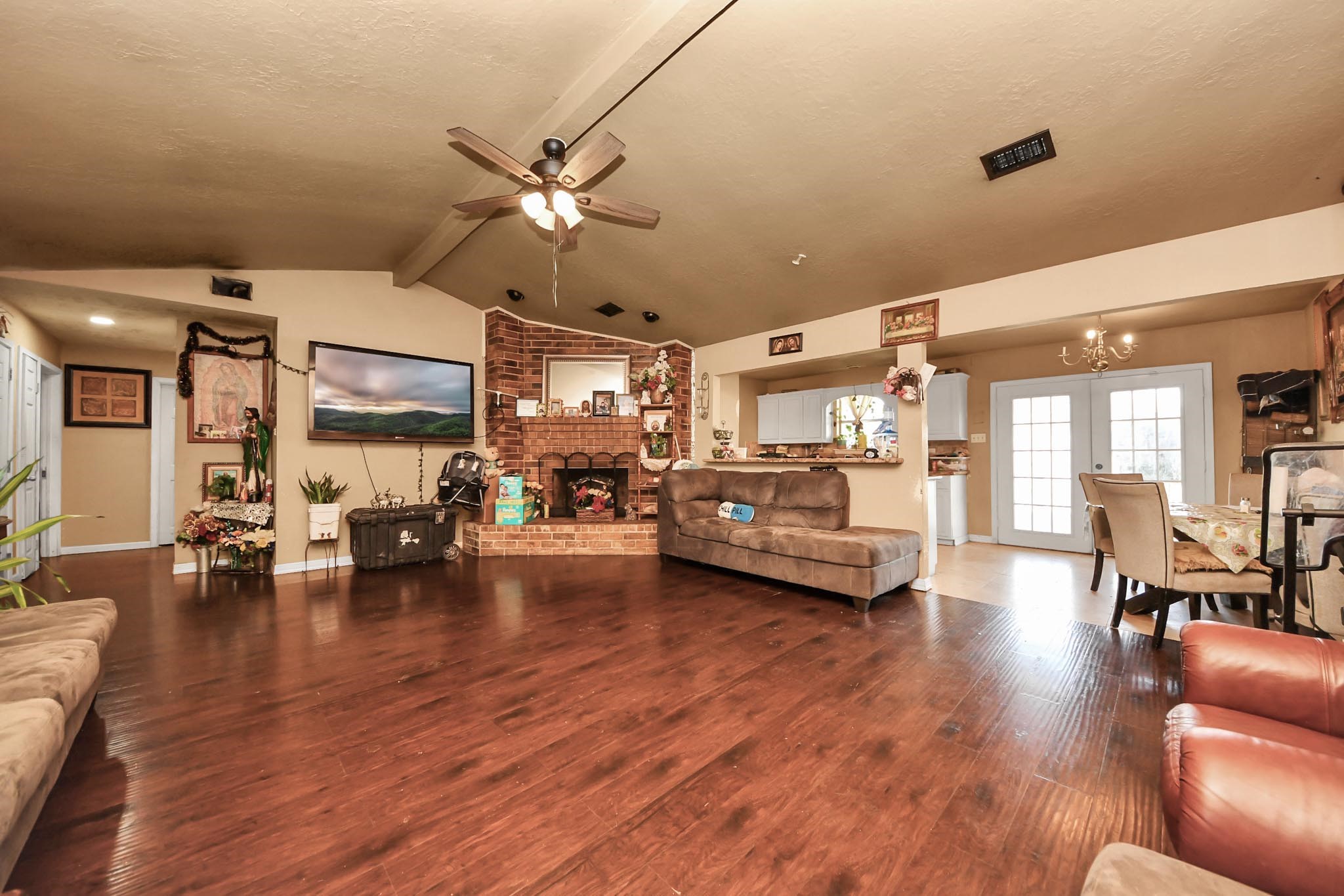 6719 Rubilee Avenue Humble, TX 77396 - Photo 7 of 23 a living room with furniture and a large window