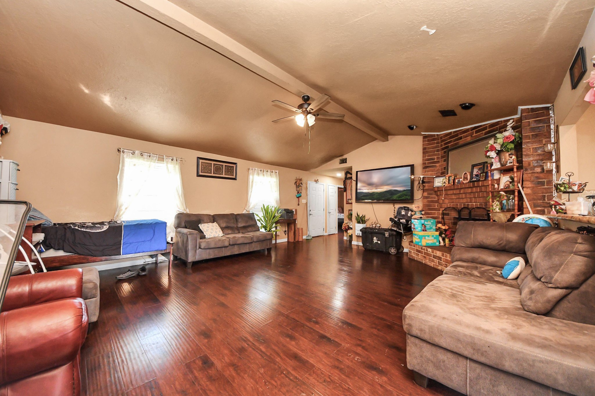6719 Rubilee Avenue Humble, TX 77396 - Photo 8 of 23 a living room with furniture and a wooden floor