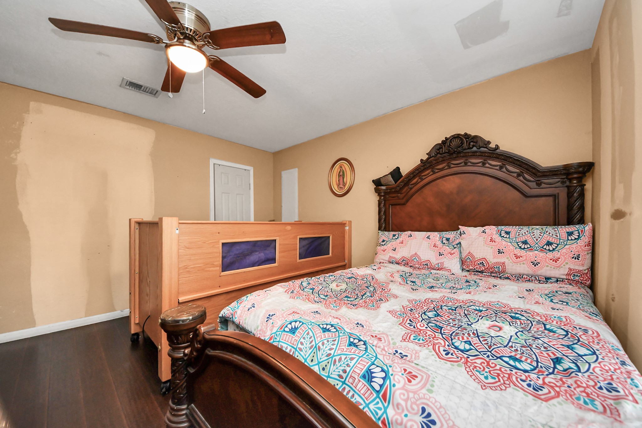 6719 Rubilee Avenue Humble, TX 77396 - Photo 9 of 23 a bedroom with a bed and a dresser