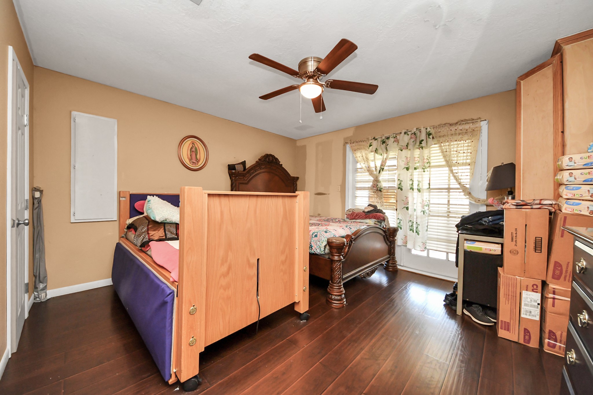 6719 Rubilee Avenue Humble, TX 77396 - Photo 10 of 23 a view of a livingroom with furniture hardwood floor and windows