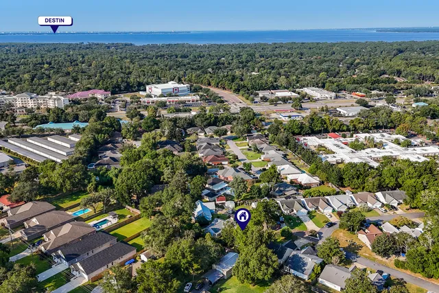 a view of room that has a wooden floor