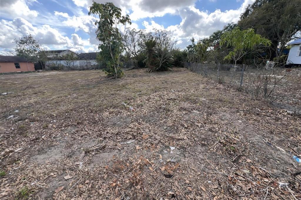 841 Booker Avenue Sebring, FL 33870 - Photo 2 of 3 a view of an outdoor space with trees