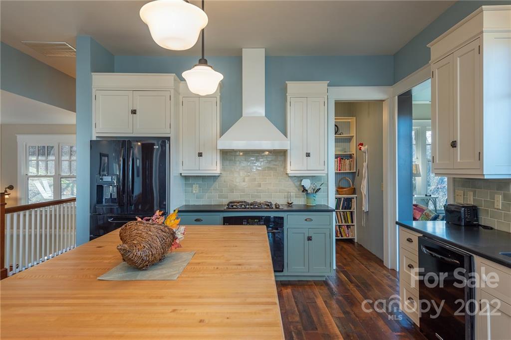 1116 Glades Road Clyde, NC 28721 - Photo 10 of 48 a kitchen with a sink cabinets and window