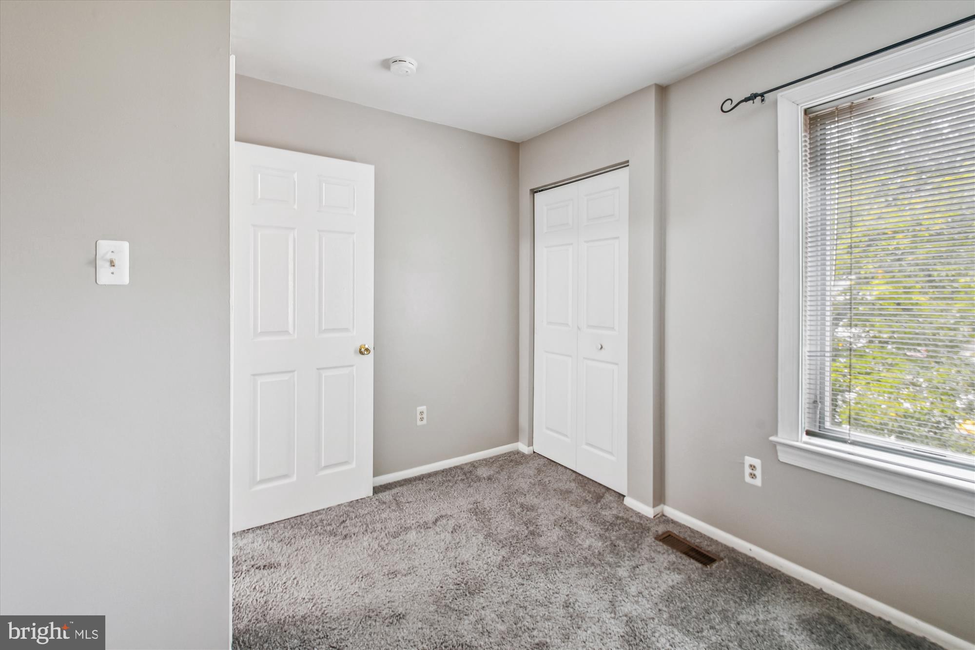 9469 Clocktower Lane Columbia, MD 21046 - Photo 21 of 28 a view of an empty room with a window