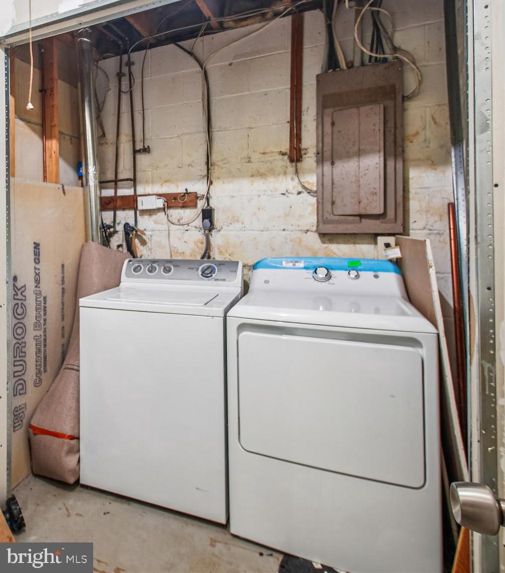 9469 Clocktower Lane Columbia, MD 21046 - Photo 27 of 28 a utility room with dryer and washer