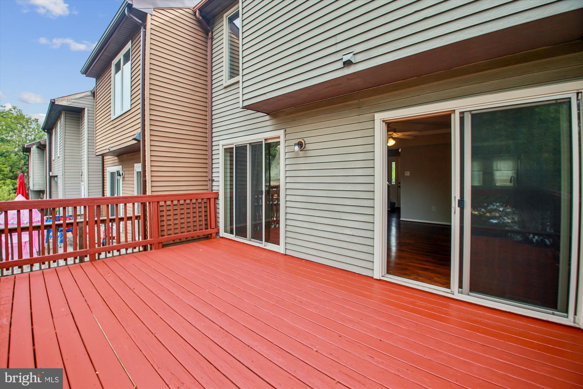 9469 Clocktower Lane Columbia, MD 21046 - Photo 3 of 28 a view of a house with wooden deck