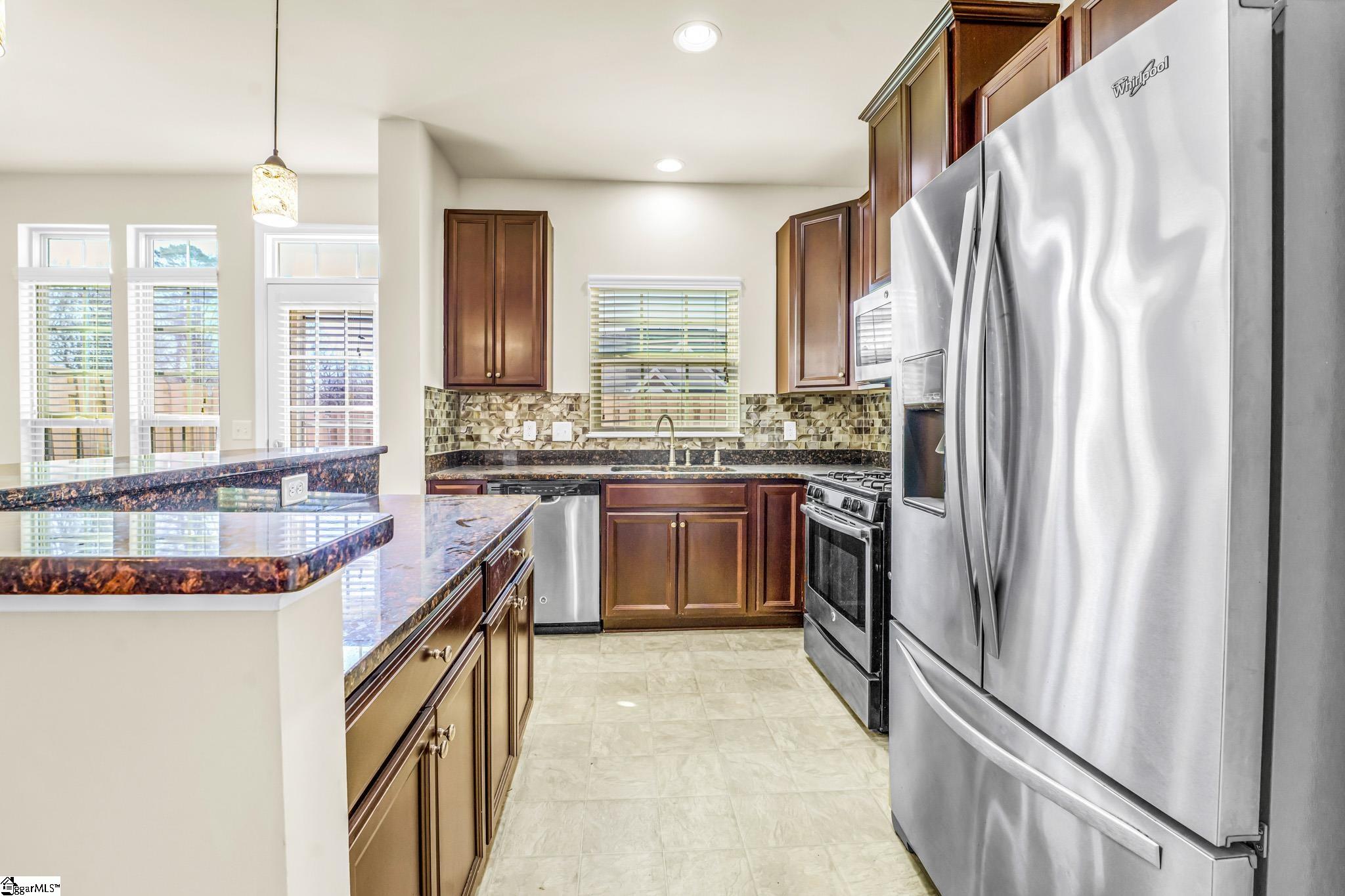 446 Christiane Way Greenville, SC 29607 - Photo 8 of 24 Features granite counter tops.