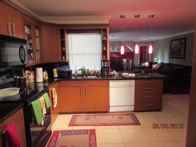 8720 Hidden Pines Road Fort Pierce, FL 34945 - Photo 6 of 31 6 kitchen 2
