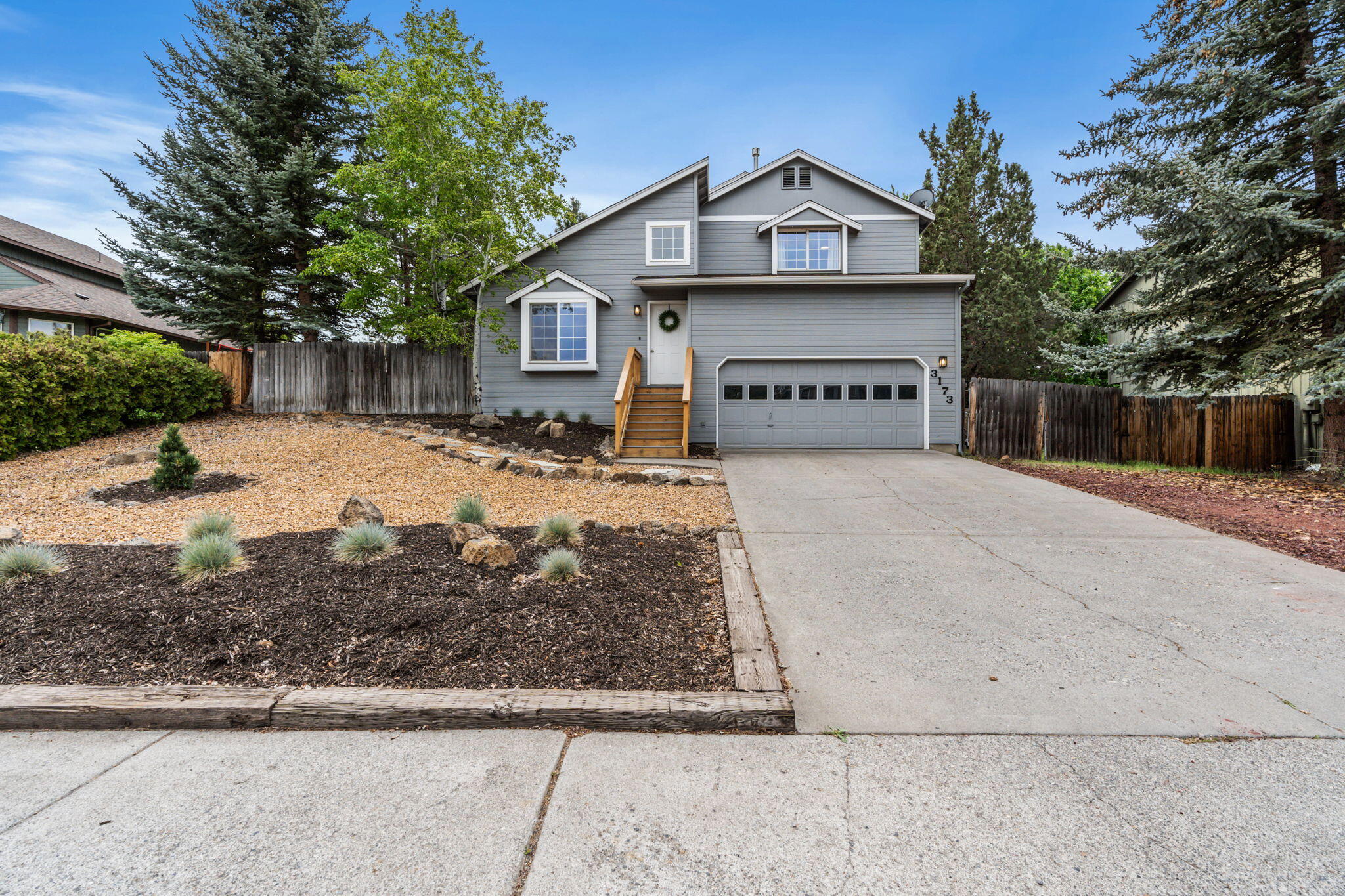 3173 Northeast Manchester Avenue Bend, OR 97701 - Photo 2 of 30 2024_05_21_3173_ne_manchester_ave-1