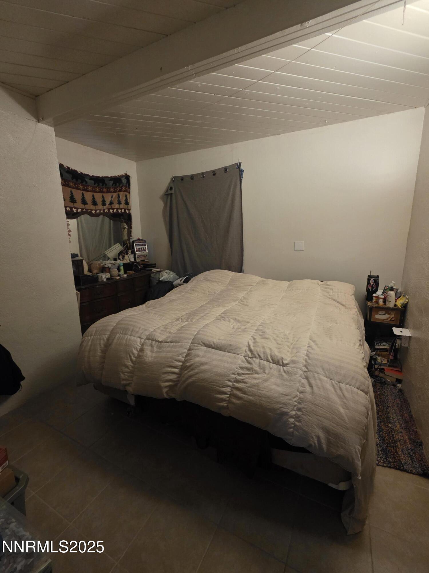 107 English Street Hawthorne, NV 89415 - Photo 11 of 21 a bedroom with a bed and window