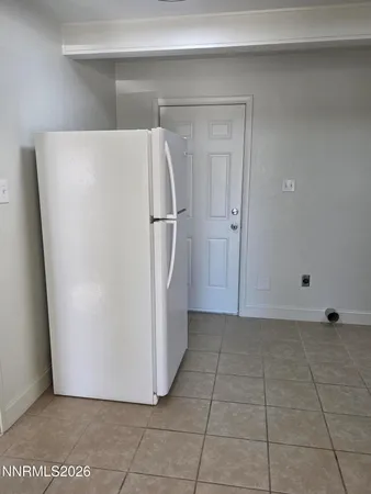 a bathroom with a toilet and a bathtub