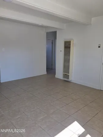 a kitchen with a cabinets and a stove top oven