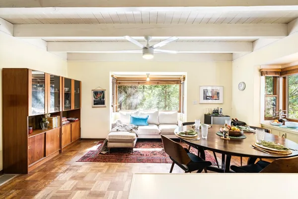 a bathroom with a sink toilet and mirror