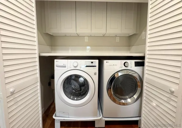 a utility room with dryer and washer