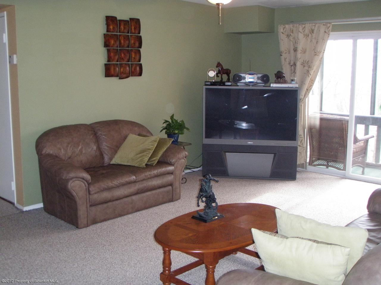 1206 Summit Pointe Scranton, PA 18508 - Photo 2 of 14 a living room with furniture and a window