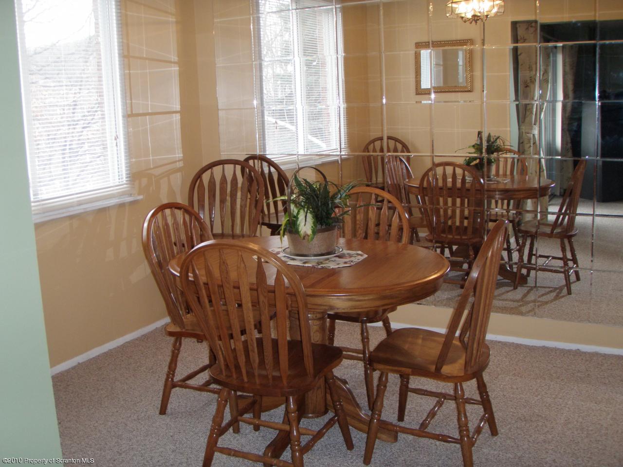 1206 Summit Pointe Scranton, PA 18508 - Photo 3 of 14 a view of a dining room with furniture and window