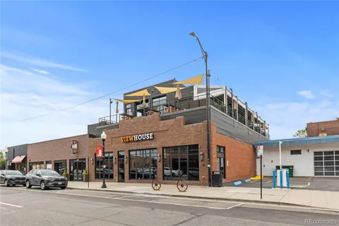 a view of a building with a street