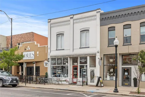 a front view of a building with a street