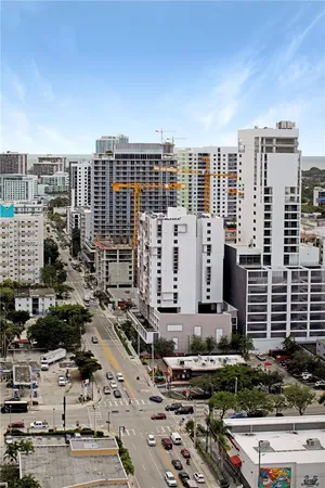 a view of a city with tall buildings