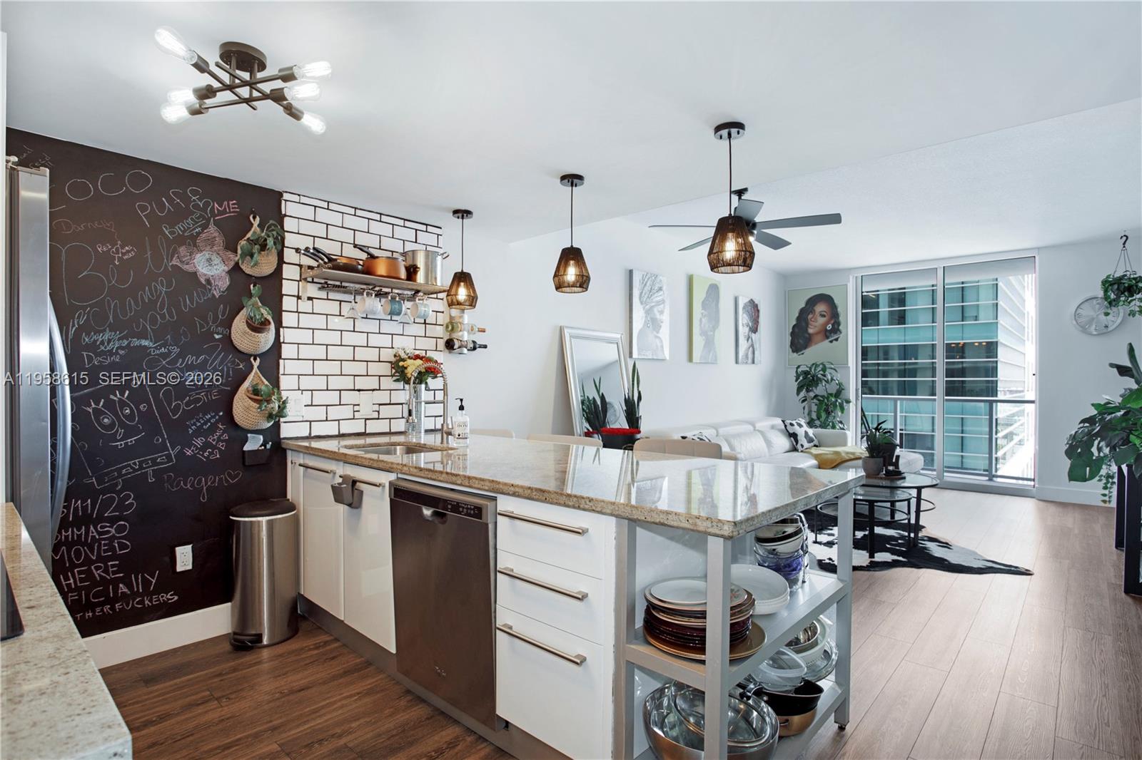 185 Southwest 7th Street, Unit 2514 Miami, FL 33130 - Photo 9 of 33 a living room with furniture and wooden floor