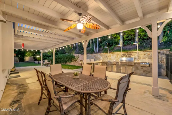 a view of yard with patio