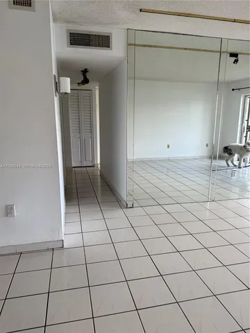 a view of a refrigerator and window