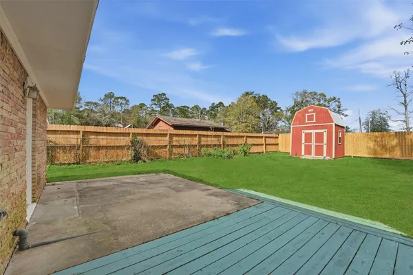 a view of a big yard next to a yard