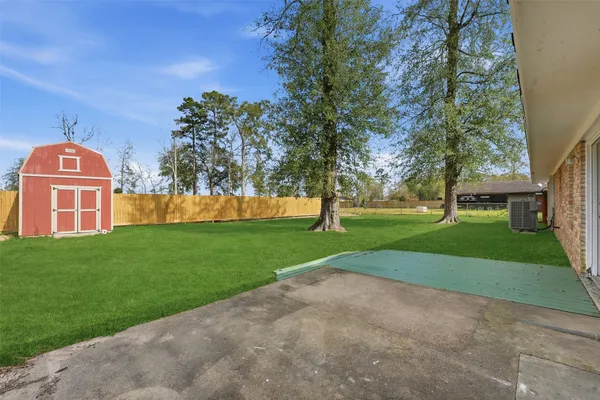 a view of a yard in front of a house