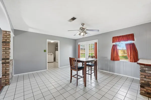 a view of a dining room with furniture