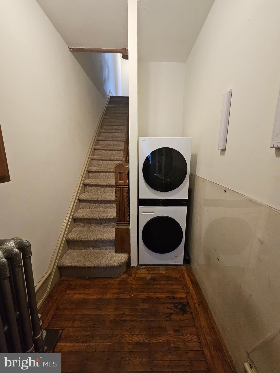4356 Manayunk Avenue, Unit 2 Philadelphia, PA 19128 - Photo 35 of 43 a view of a hallway with washer and dryer