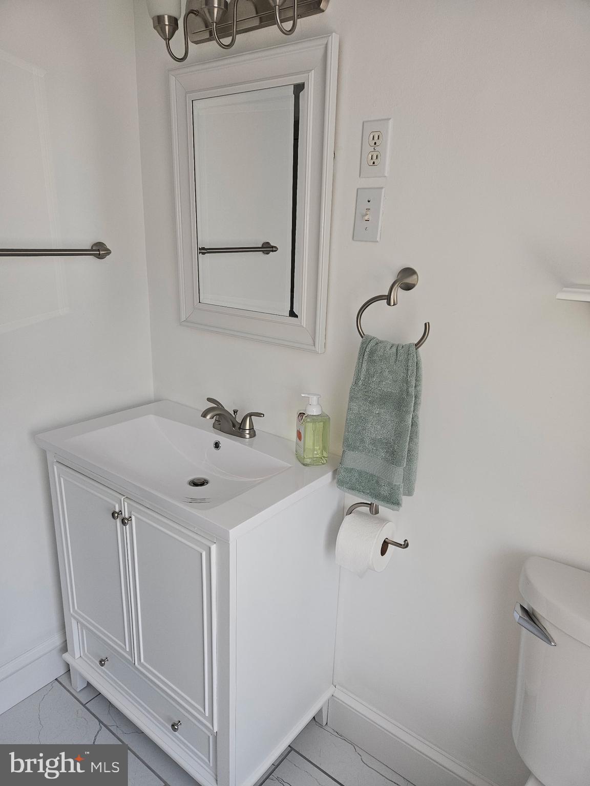 4356 Manayunk Avenue, Unit 2 Philadelphia, PA 19128 - Photo 40 of 43 a bathroom with a sink and a mirror