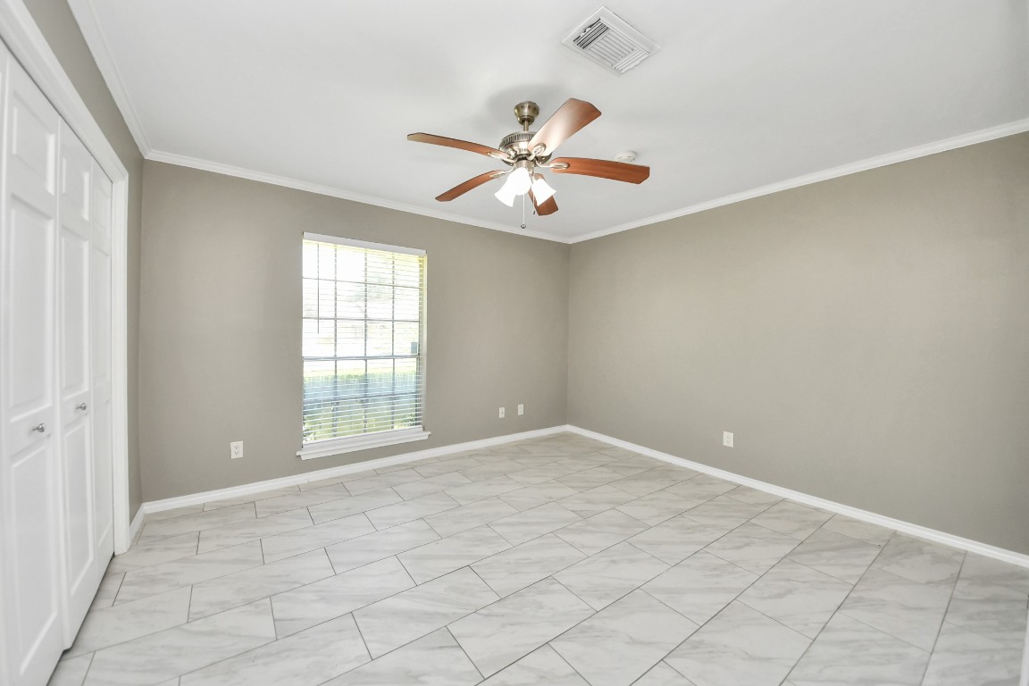 8119 Concho Street Houston, TX 77036 - Photo 17 of 35 First floor Secondary Bedroom