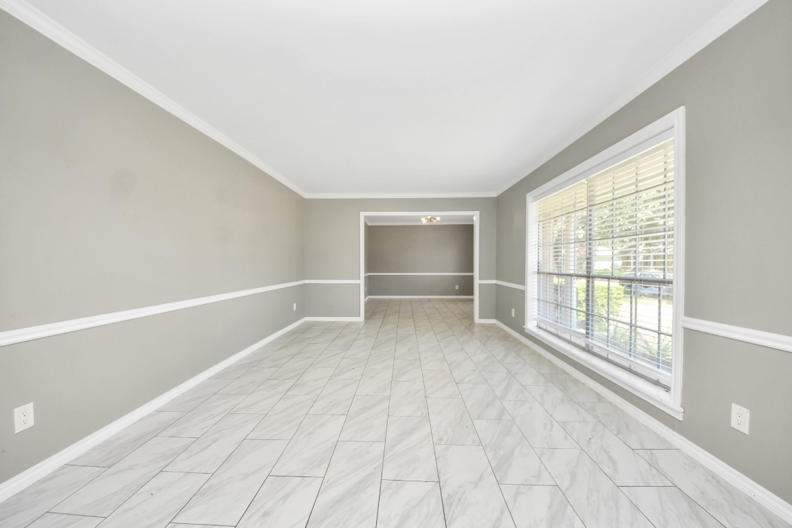 8119 Concho Street Houston, TX 77036 - Photo 4 of 35 Formal Living has tons of natural light