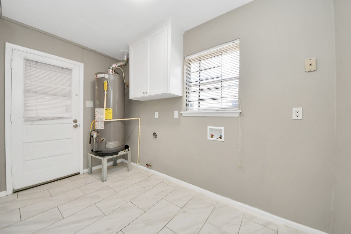 8119 Concho Street Houston, TX 77036 - Photo 9 of 35 Firs floor utility room