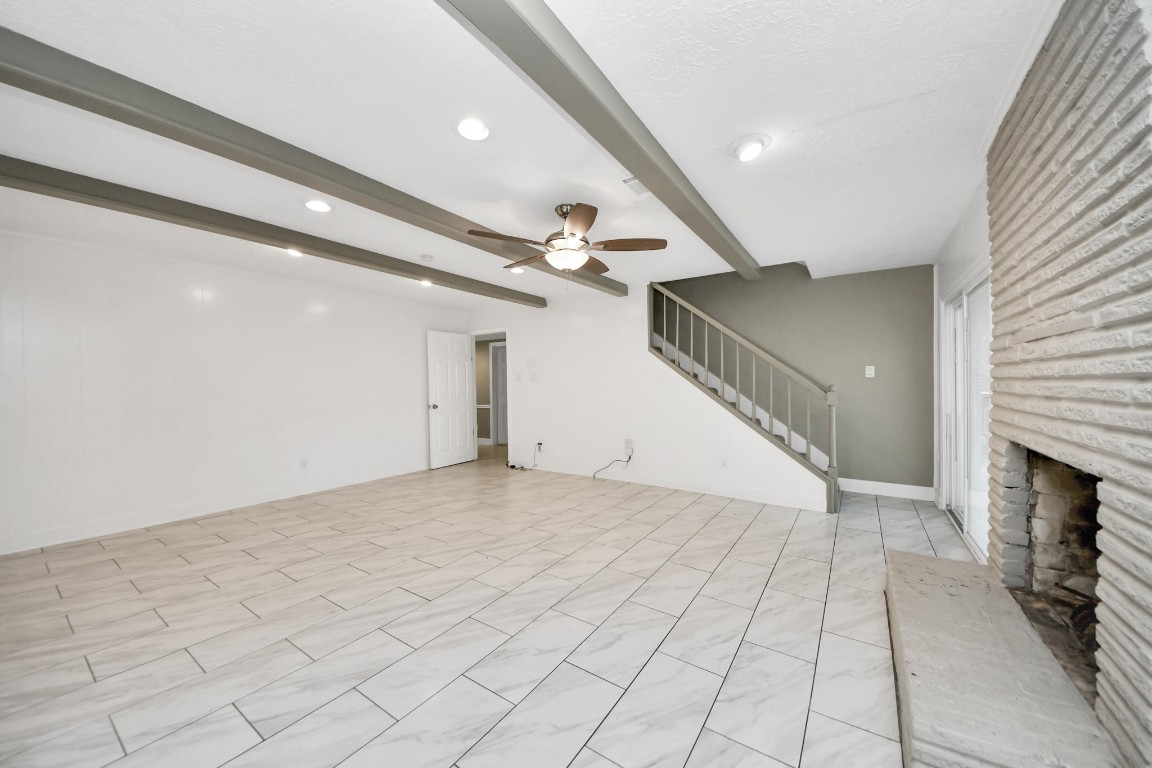 8119 Concho Street Houston, TX 77036 - Photo 10 of 35 This living room is truly massive!