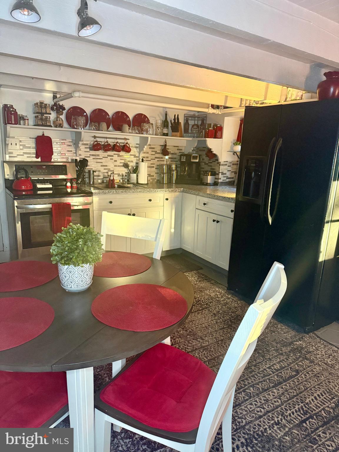 3124 Gray Street Reading, PA 19605 - Photo 8 of 13 a view of a dining room with furniture