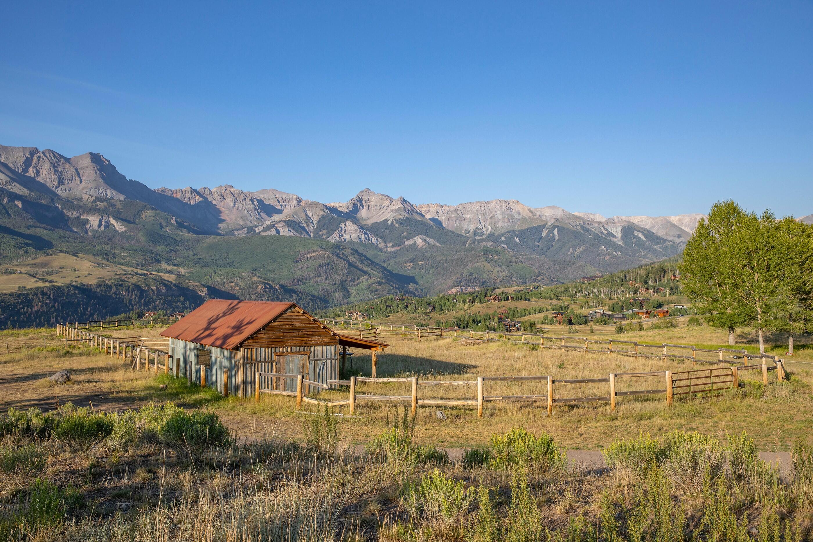 975 B Wagner Way Telluride, CO 81435 - Photo 11 of 20 a view of houses with a lake and mountain view