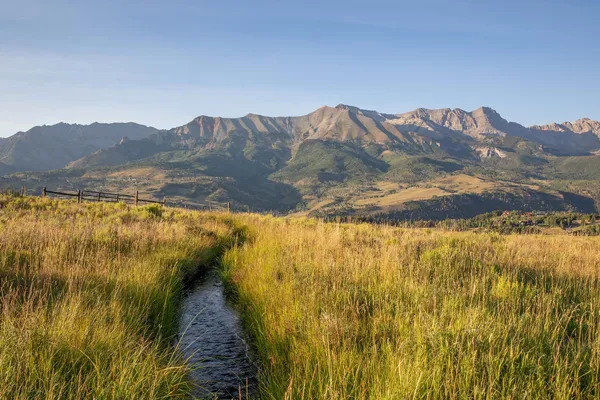 a view of lake and mountain