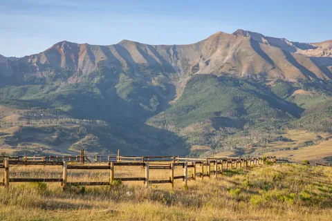 a view of a swimming pool with mountain view